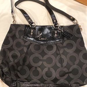 Gently used Coach bag w/divided center.
